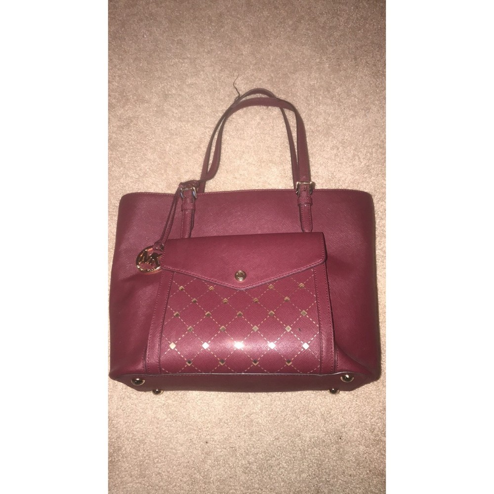 Michael Kors Burgundy Maroon Handbag with Die Cut Accent with Gold